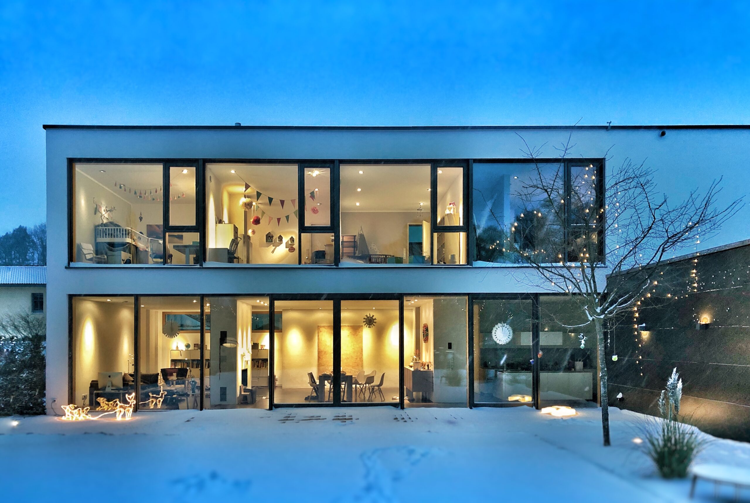 two story home in the winter