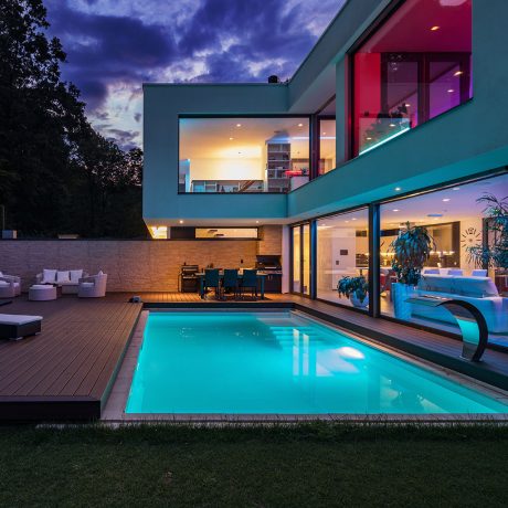 Modern villa with colored led lights at night